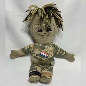 Soldier doll w spot to slide in photo used but good condition